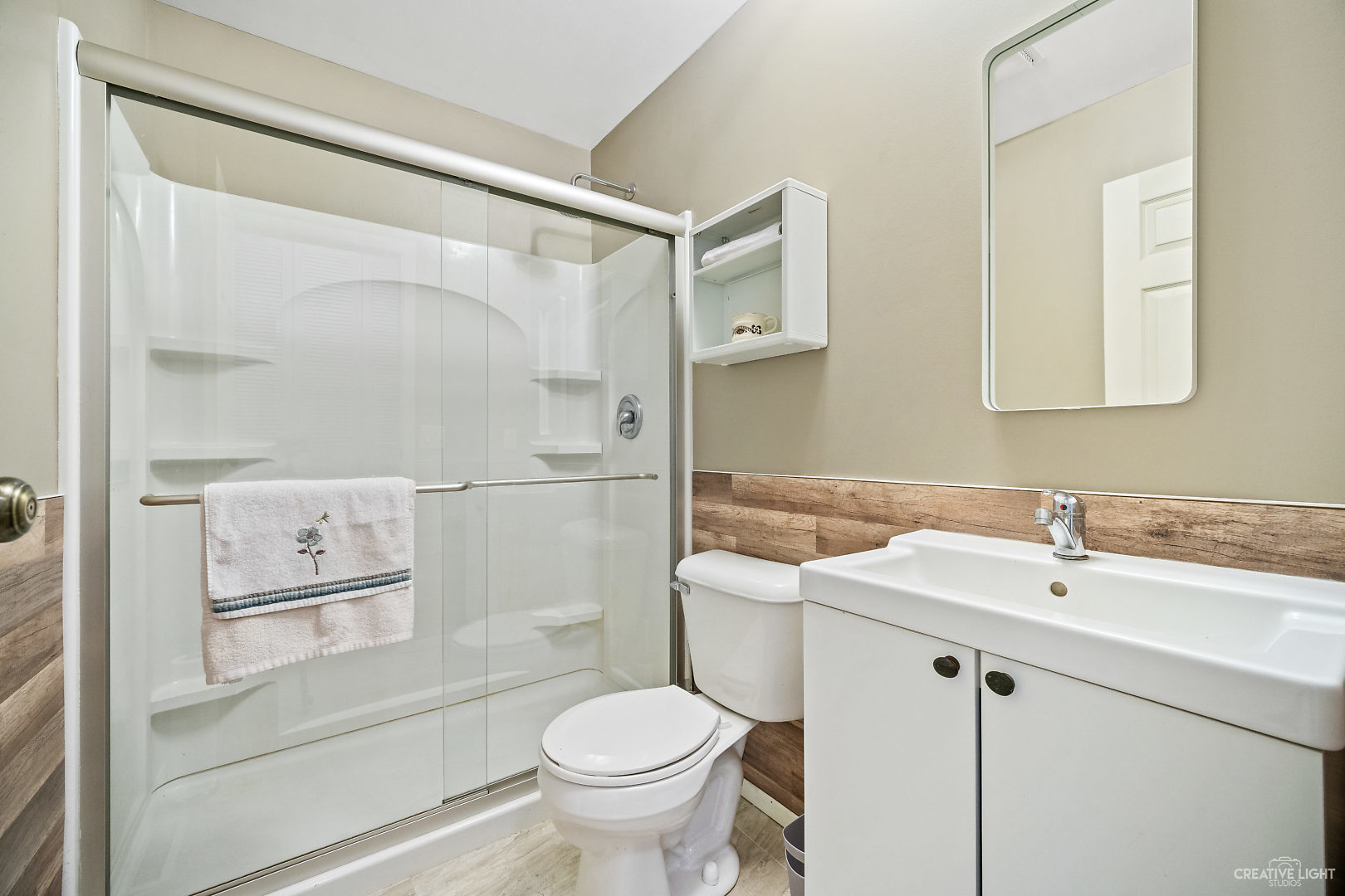 23 Aldon Road Montgomery, IL 60538 - Photo 17 of 31 a bathroom with a sink a toilet and shower