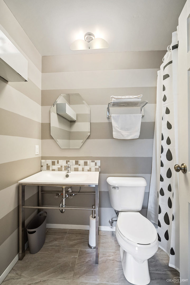 23 Aldon Road Montgomery, IL 60538 - Photo 20 of 31 a bathroom with a toilet a sink and a mirror