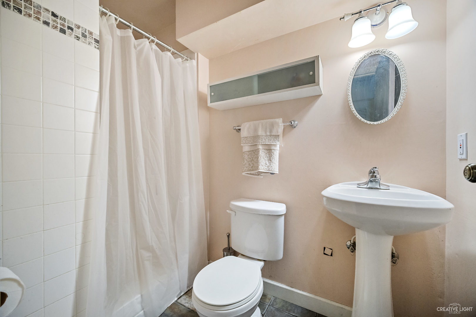 23 Aldon Road Montgomery, IL 60538 - Photo 26 of 31 a bathroom with a sink a mirror a toilet and a mirror
