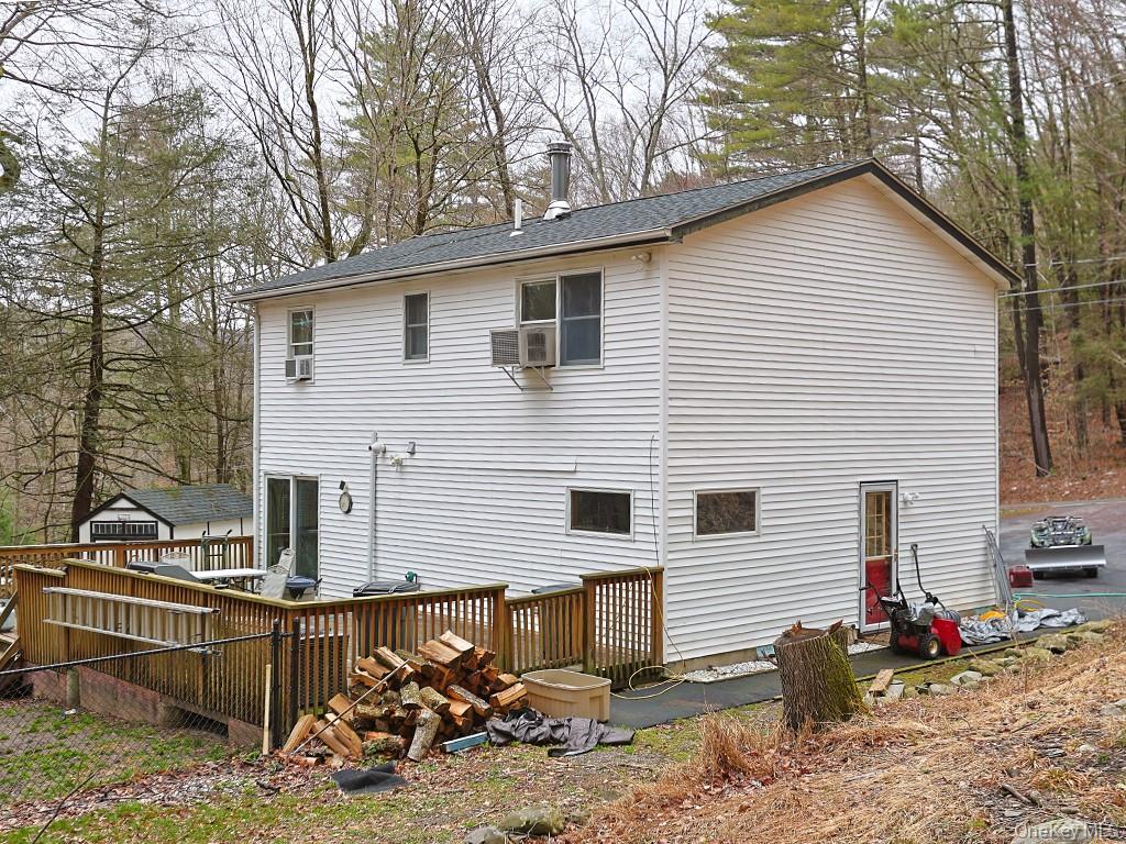 68 Kennel Road Cuddebackville, NY 12729 - Photo 4 of 21 a view of a house with a yard