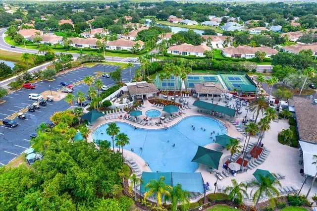 an aerial view of a houses with outdoor space