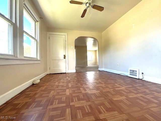 14628 Granger Road Maple Heights, OH 44137 - Photo 34 of 45 Unfurnished room featuring ceiling fan and dark parquet flooring
