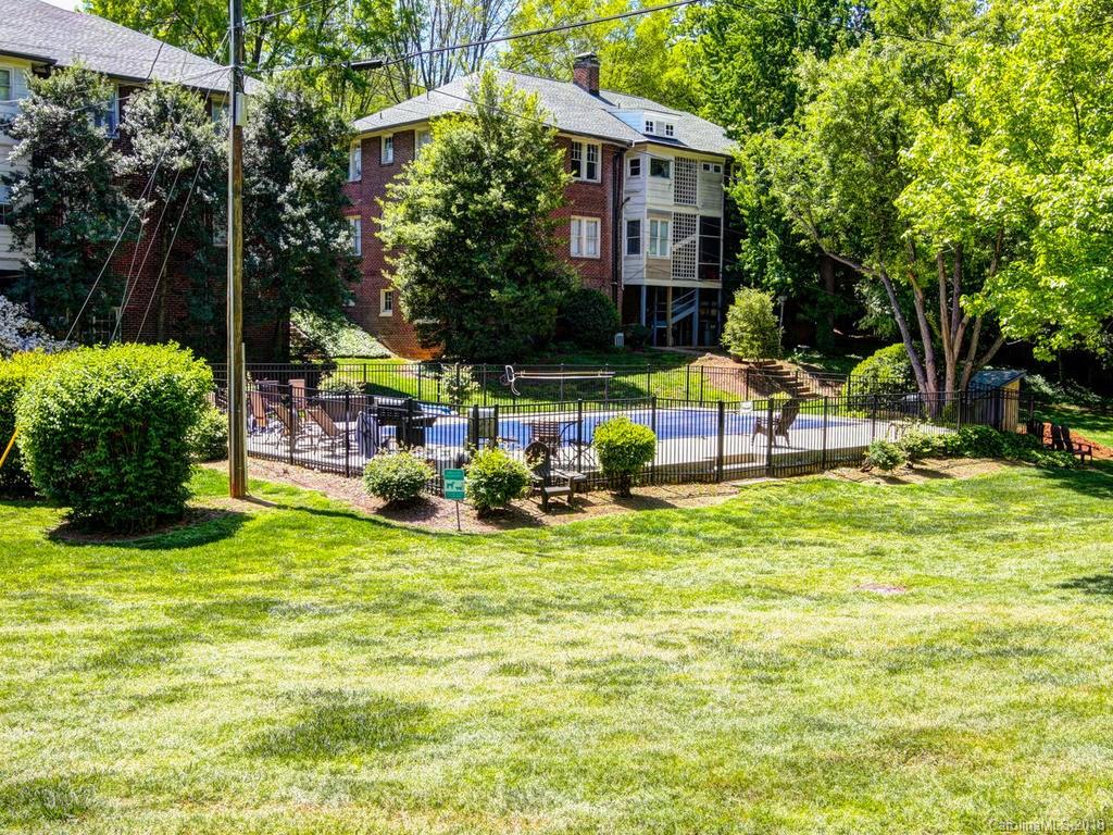226 Providence Road Charlotte, NC 28207 - Photo 13 of 13 a view of an house with swimming pool and sitting area