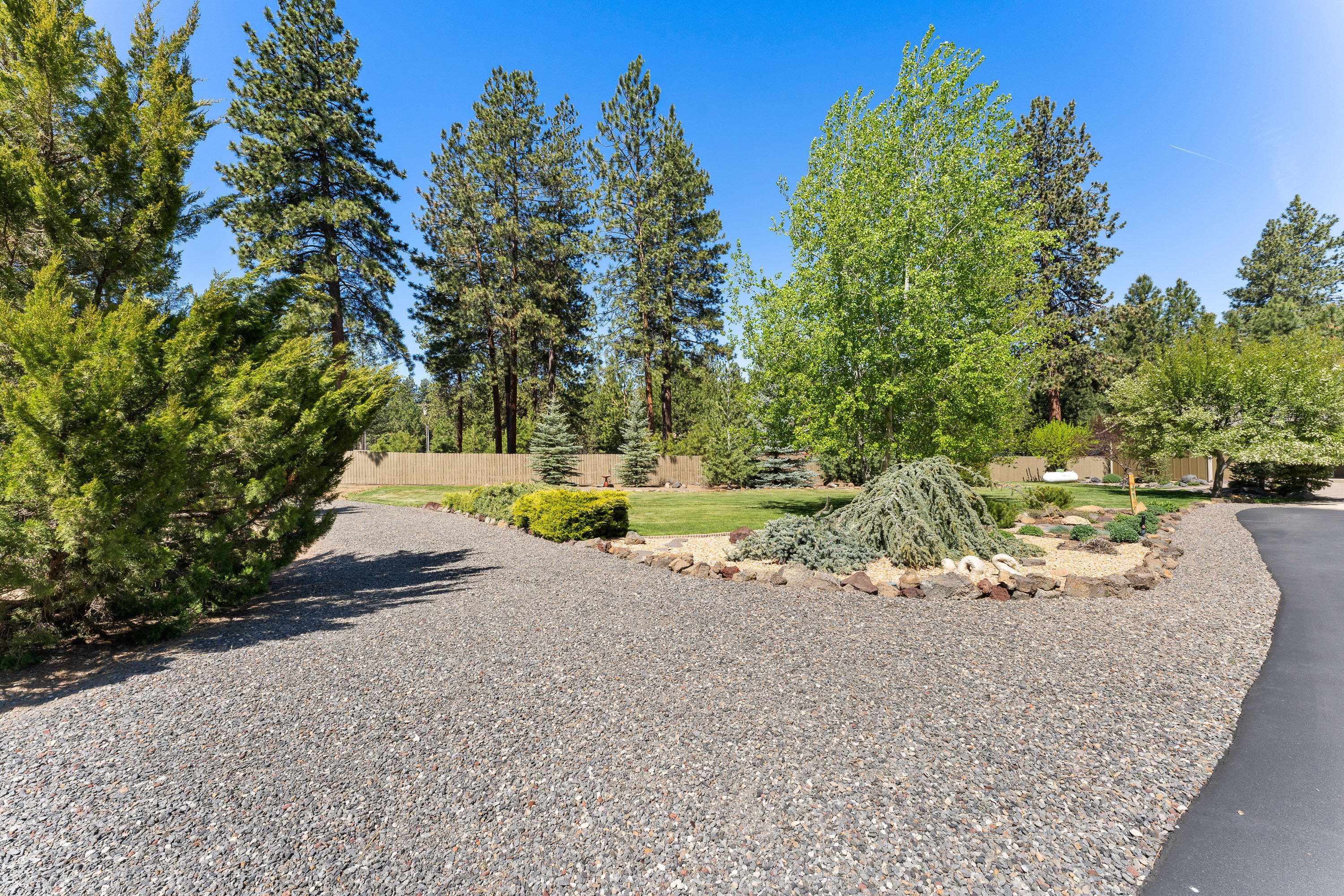 19236 Kiowa Road Bend, OR 97702 - Photo 47 of 52 a view of a park with large trees