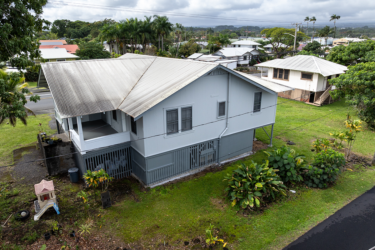 615 Kekuanaoa Street Hilo, HI 96720 - Photo 2 of 29 a aerial view of a house with a yard and lake view