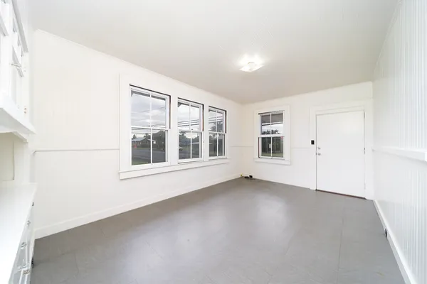 an empty room with windows