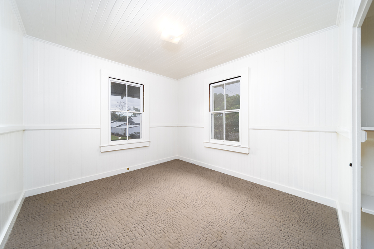 615 Kekuanaoa Street Hilo, HI 96720 - Photo 23 of 29 an empty room with windows