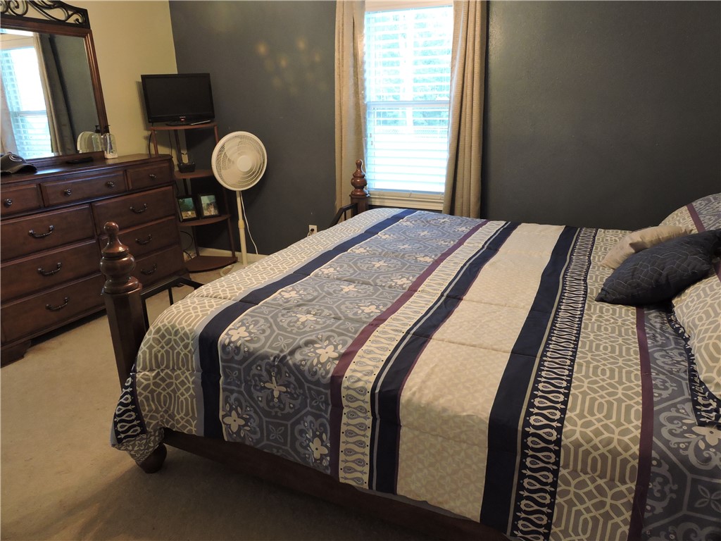 1901 Hattons Ford Road Townville, SC 29689 - Photo 22 of 33 A comfortable bedroom with a generous window providing natural illumination.