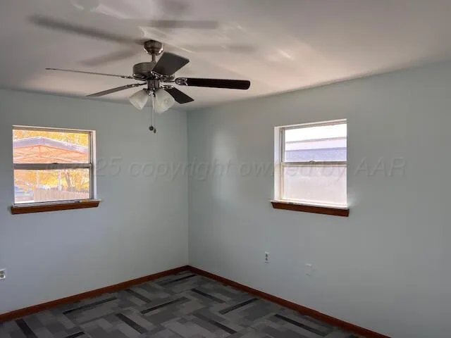 a view of a window in an empty room