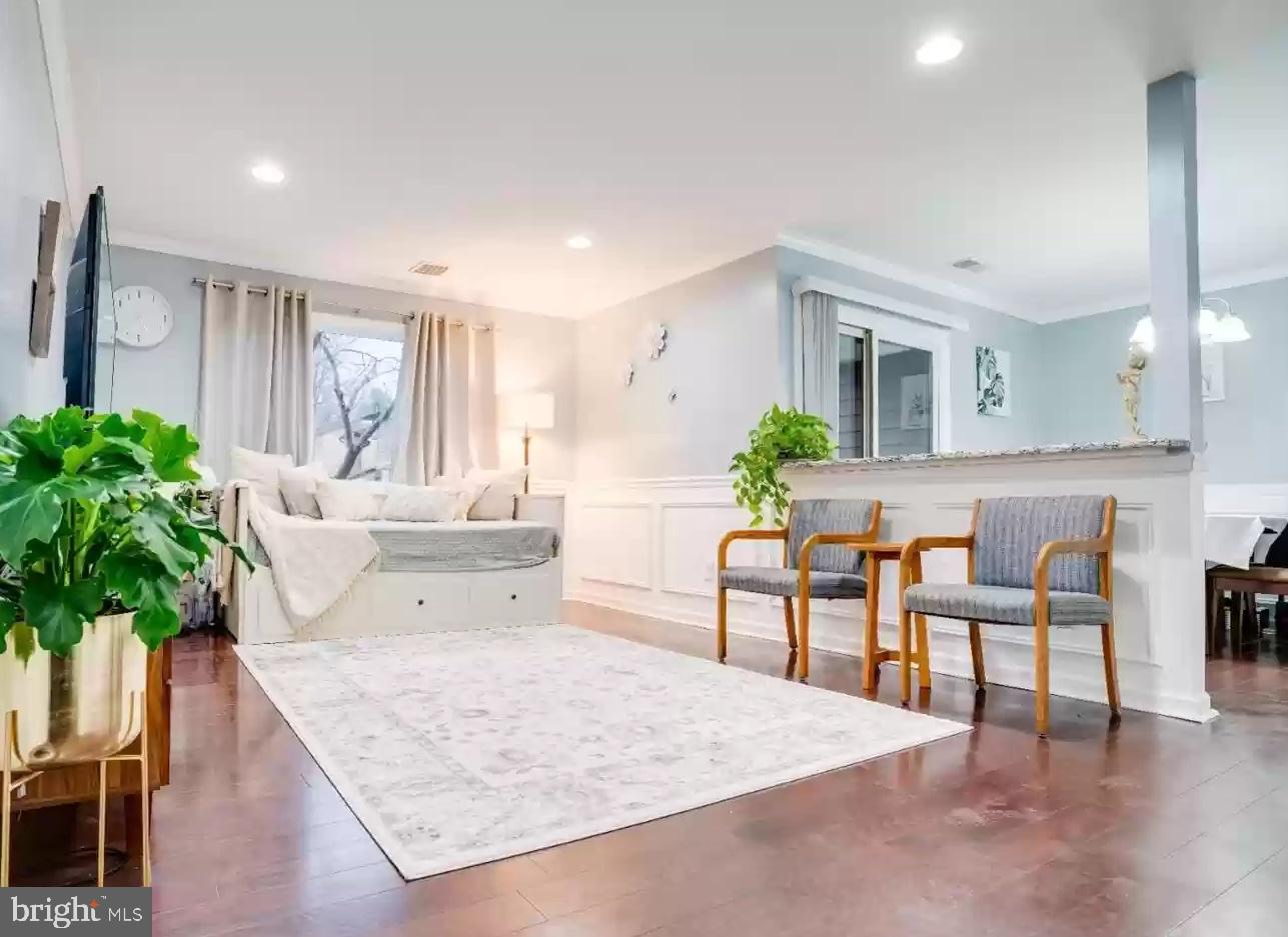 3121 Sayre Drive Princeton, NJ 08540 - Photo 4 of 10 a view of a dining room with furniture and a potted plant