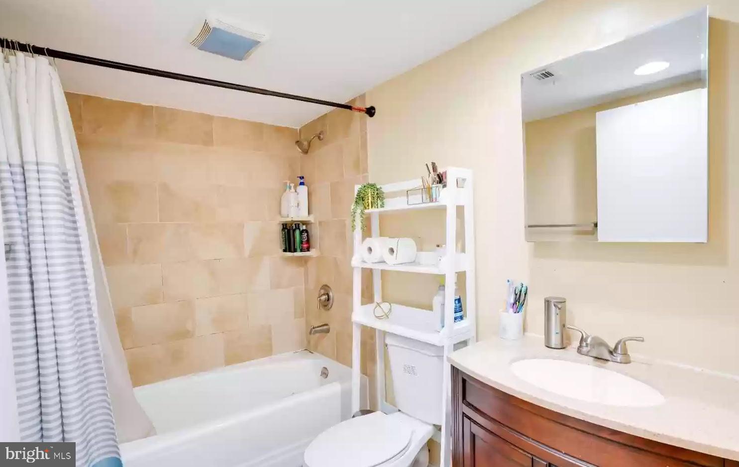 3121 Sayre Drive Princeton, NJ 08540 - Photo 10 of 10 a bathroom with a sink toilet and shower