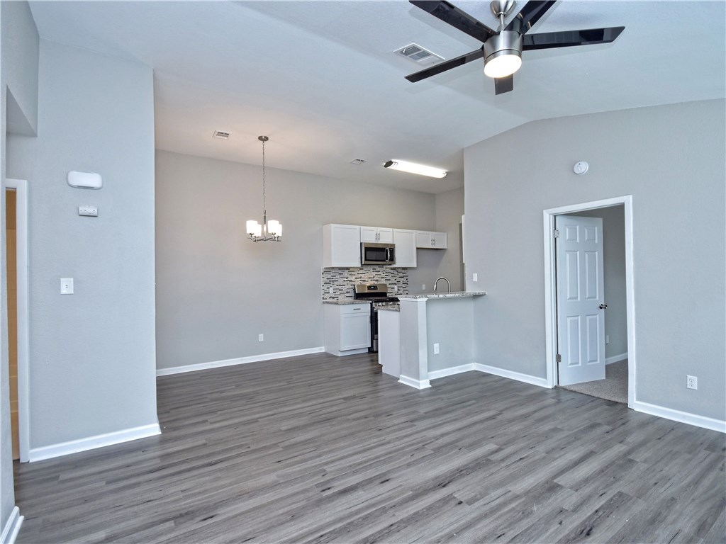 2302 Fuzz Fairway, Unit B Austin, TX 78728 - Photo 1 of 27 Spacious Dining Room could also be a flex room. Possible office space or extra living room!