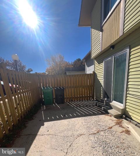 16 Brian Court, Unit 245 Gaithersburg, MD 20877 - Photo 21 of 22 a view of a backyard with wooden fence