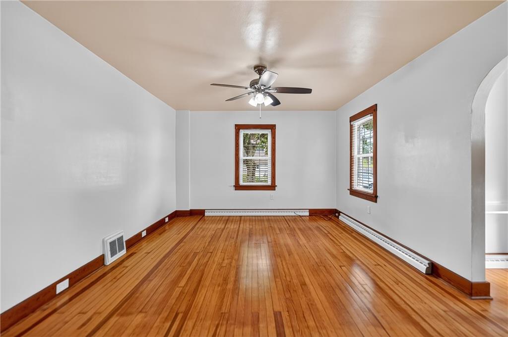1605 Maratta Road Aliquippa, PA 15001 - Photo 17 of 34 wooden floor in an empty room with a window