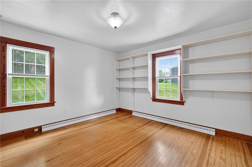 1605 Maratta Road Aliquippa, PA 15001 - Photo 19 of 34 wooden floor in an empty room with a window