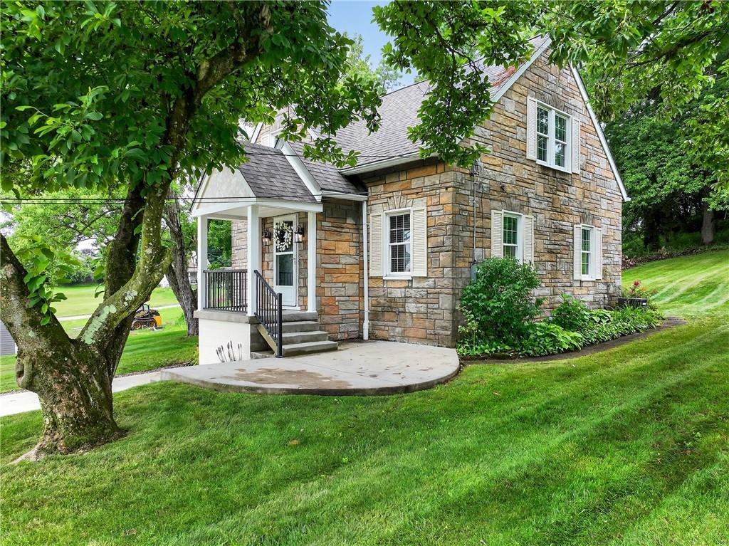 1605 Maratta Road Aliquippa, PA 15001 - Photo 2 of 34 a front view of house with a garden and patio