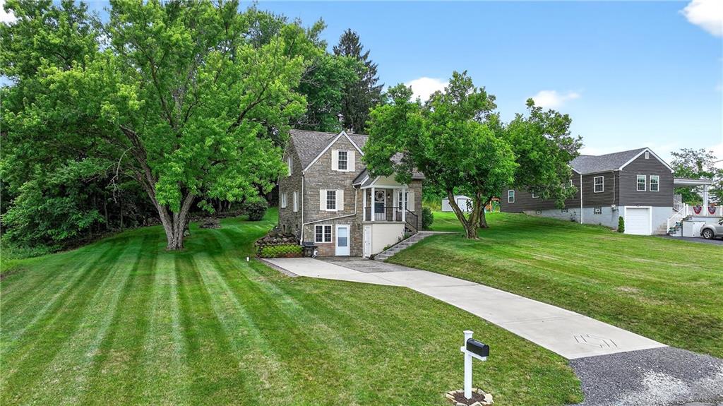 1605 Maratta Road Aliquippa, PA 15001 - Photo 4 of 34 a front view of a house with garden