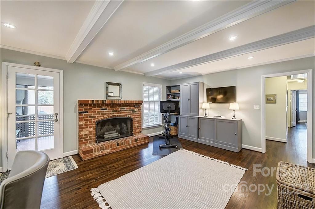 3021 Eastburn Road Charlotte, NC 28210 - Photo 14 of 48 a living room with furniture and a fireplace