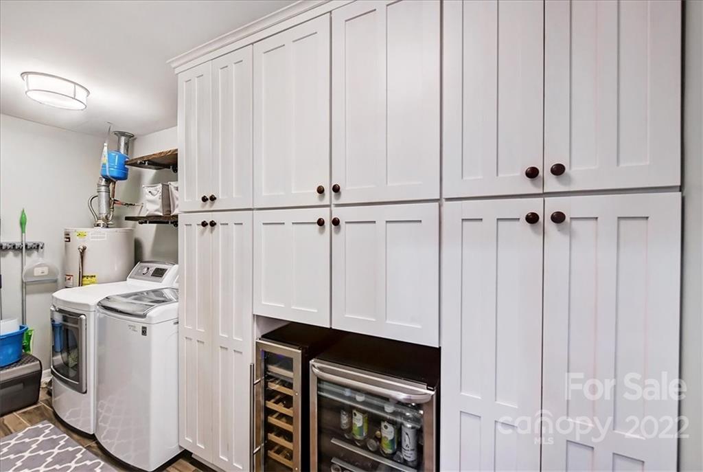 3021 Eastburn Road Charlotte, NC 28210 - Photo 26 of 48 a view of cabinets with wooden floor