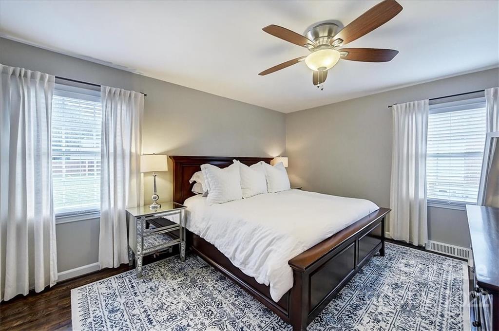 3021 Eastburn Road Charlotte, NC 28210 - Photo 27 of 48 a bed sitting in a bedroom next to a window