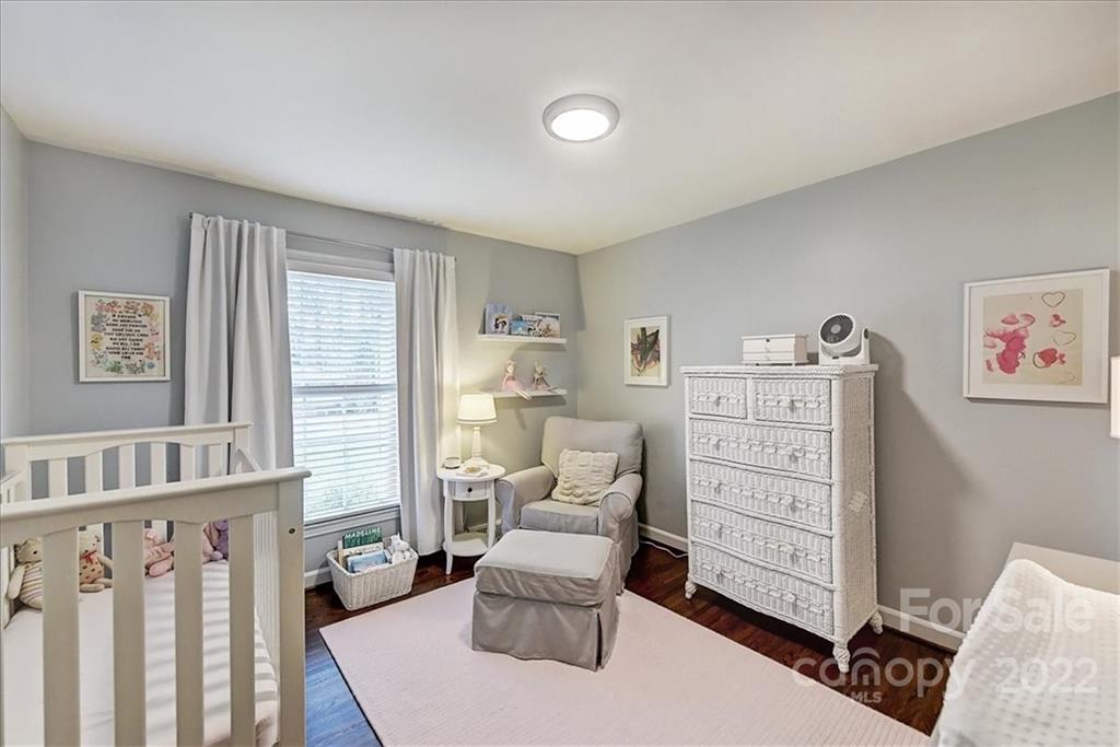 3021 Eastburn Road Charlotte, NC 28210 - Photo 35 of 48 a living room with furniture and baby crib