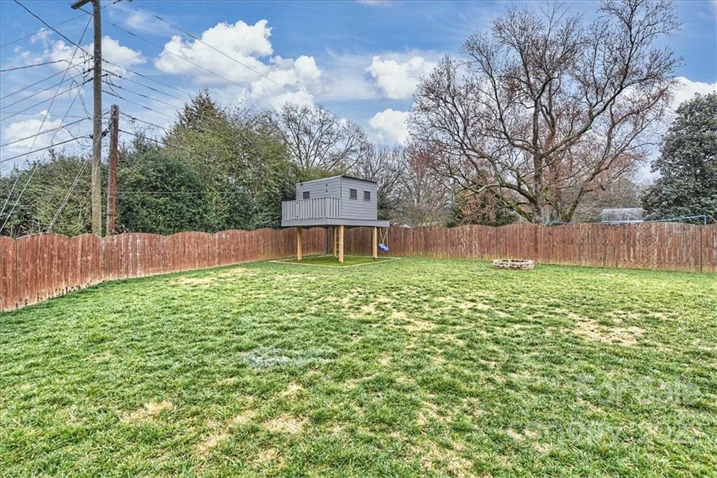 3021 Eastburn Road Charlotte, NC 28210 - Photo 40 of 48 a front view of a house with garden
