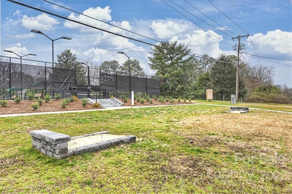 3021 Eastburn Road Charlotte, NC 28210 - Photo 45 of 48 a swimming pool with outdoor seating and yard