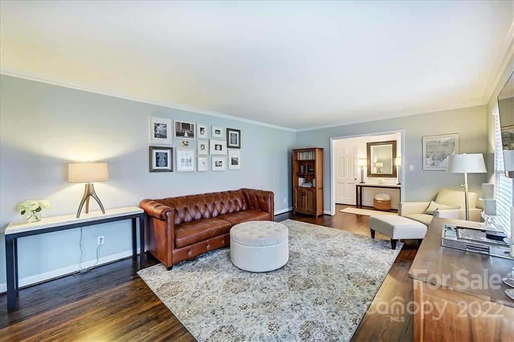 3021 Eastburn Road Charlotte, NC 28210 - Photo 6 of 48 a living room with furniture rug and wooden floor
