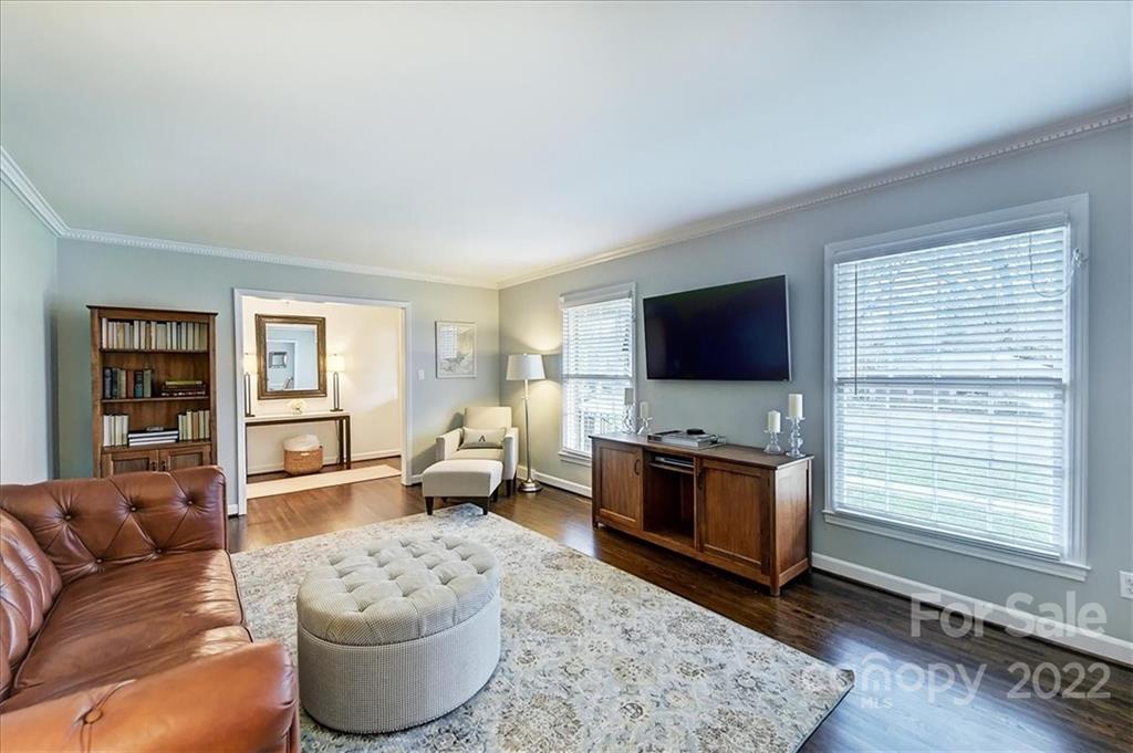 3021 Eastburn Road Charlotte, NC 28210 - Photo 7 of 48 a living room with furniture and a flat screen tv