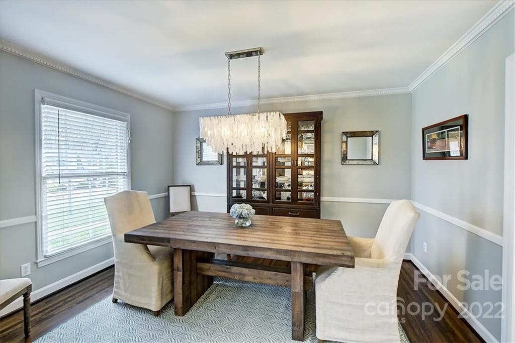 3021 Eastburn Road Charlotte, NC 28210 - Photo 8 of 48 a view of a dining room with furniture window and wooden floor