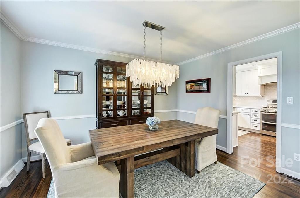 3021 Eastburn Road Charlotte, NC 28210 - Photo 9 of 48 a view of a dining room with furniture window and wooden floor