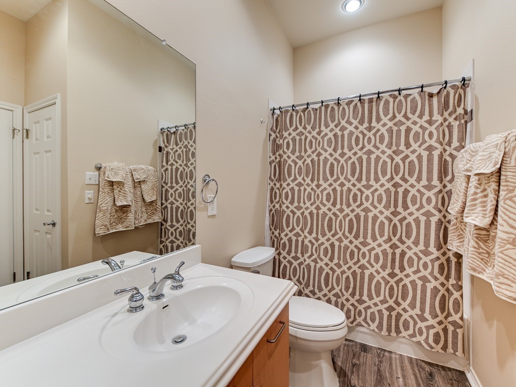 2918 Ranch Road 620 North, Unit X205 Austin, TX 78734 - Photo 11 of 23 a bathroom with a sink and a toilet