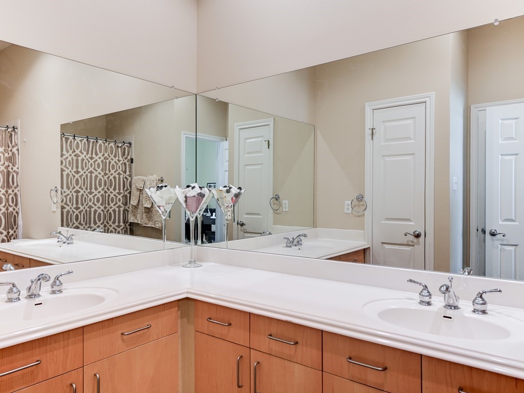 2918 Ranch Road 620 North, Unit X205 Austin, TX 78734 - Photo 12 of 23 a bathroom with a sink and a mirror