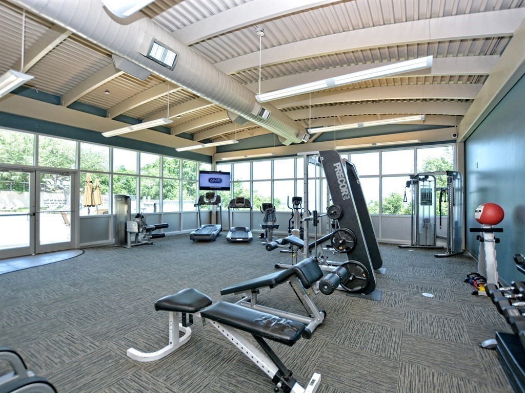 2918 Ranch Road 620 North, Unit X205 Austin, TX 78734 - Photo 18 of 23 a view of a room with gym equipment