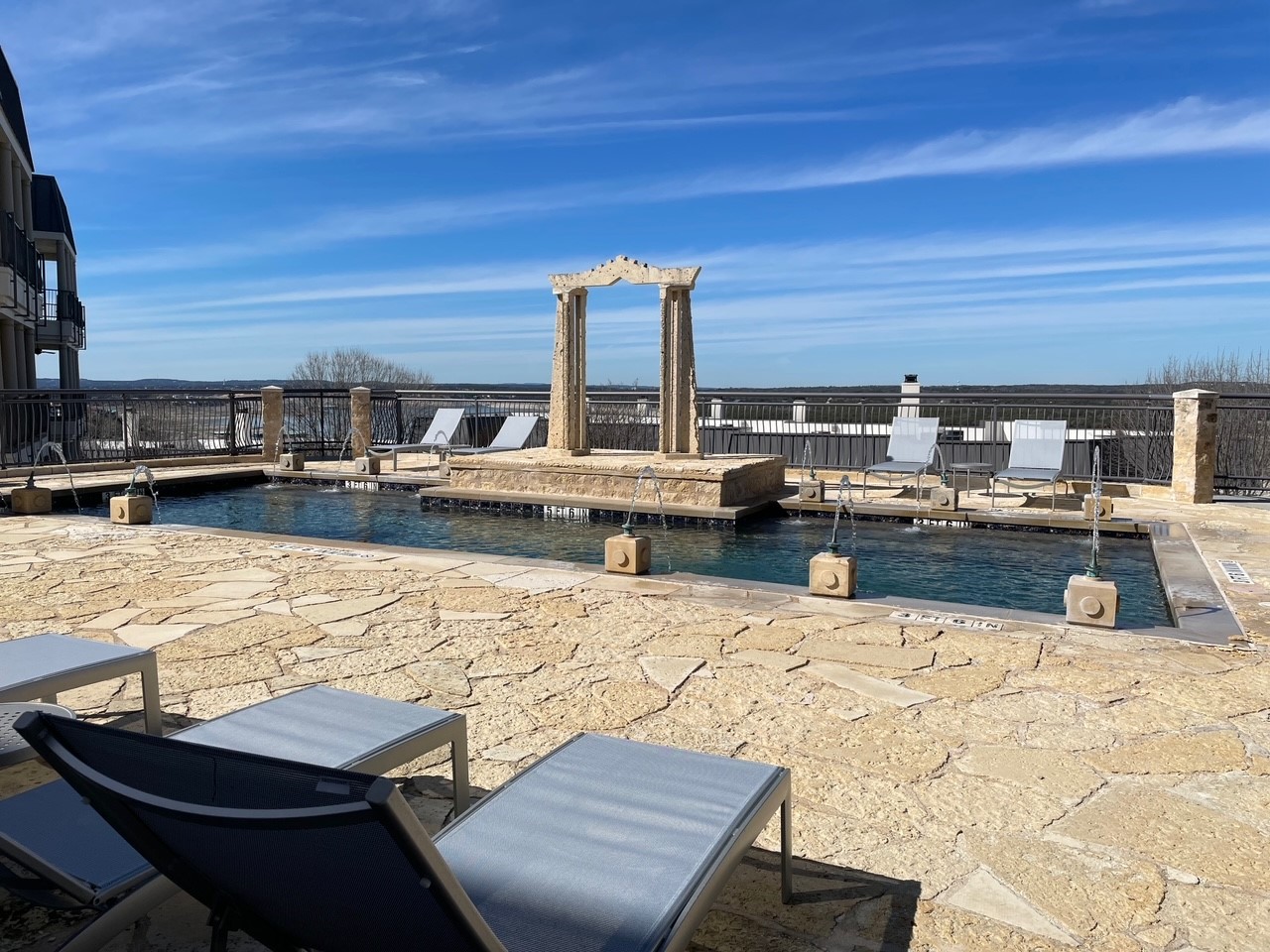 2918 Ranch Road 620 North, Unit X205 Austin, TX 78734 - Photo 20 of 23 a view of a swimming pool with outdoor seating