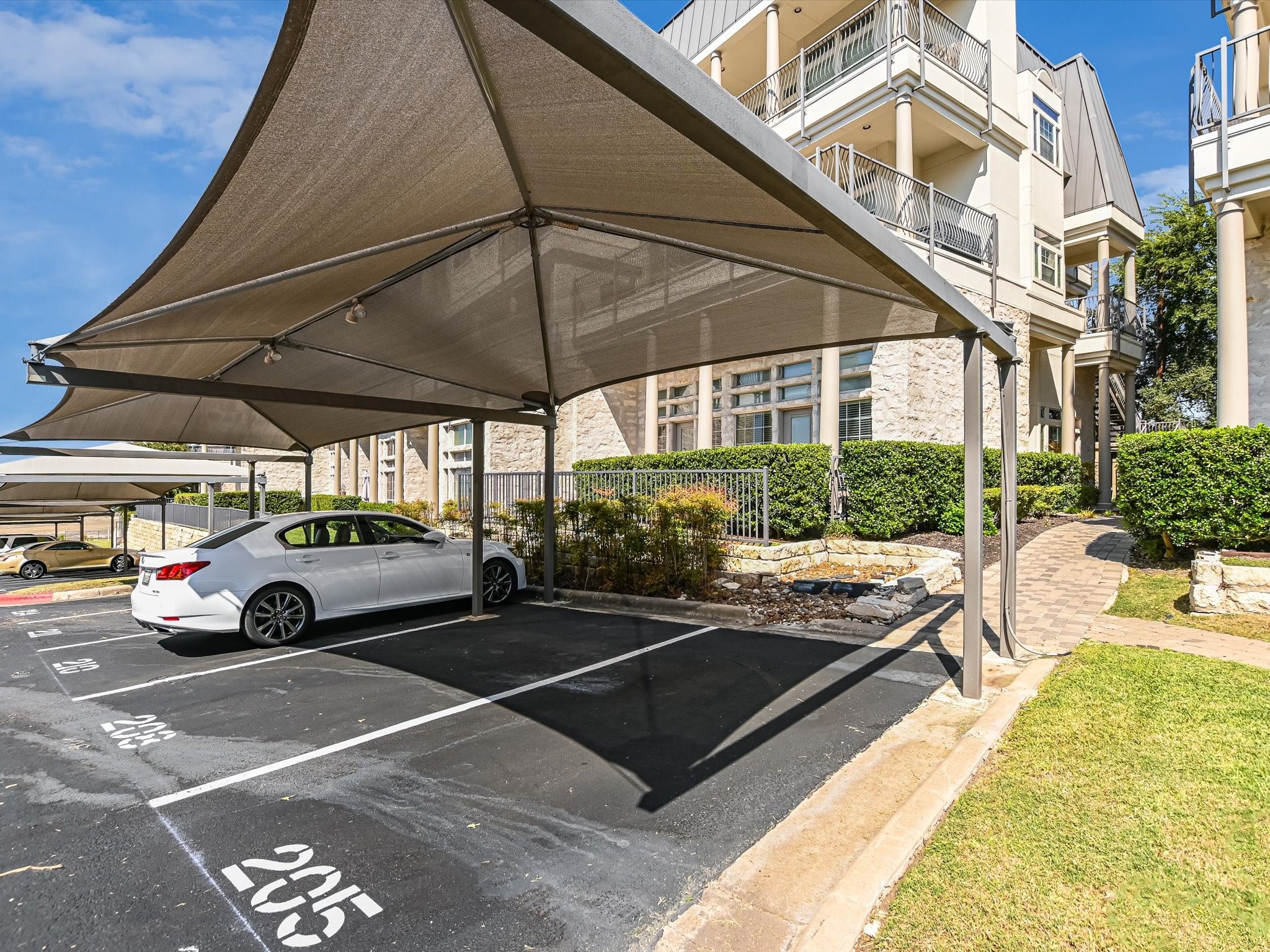 2918 Ranch Road 620 North, Unit X205 Austin, TX 78734 - Photo 2 of 23 a view of street with cars parked