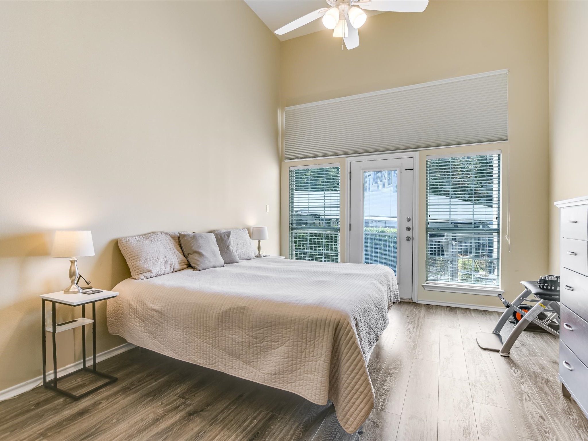 2918 Ranch Road 620 North, Unit X205 Austin, TX 78734 - Photo 7 of 23 a bedroom with a bed and a large window