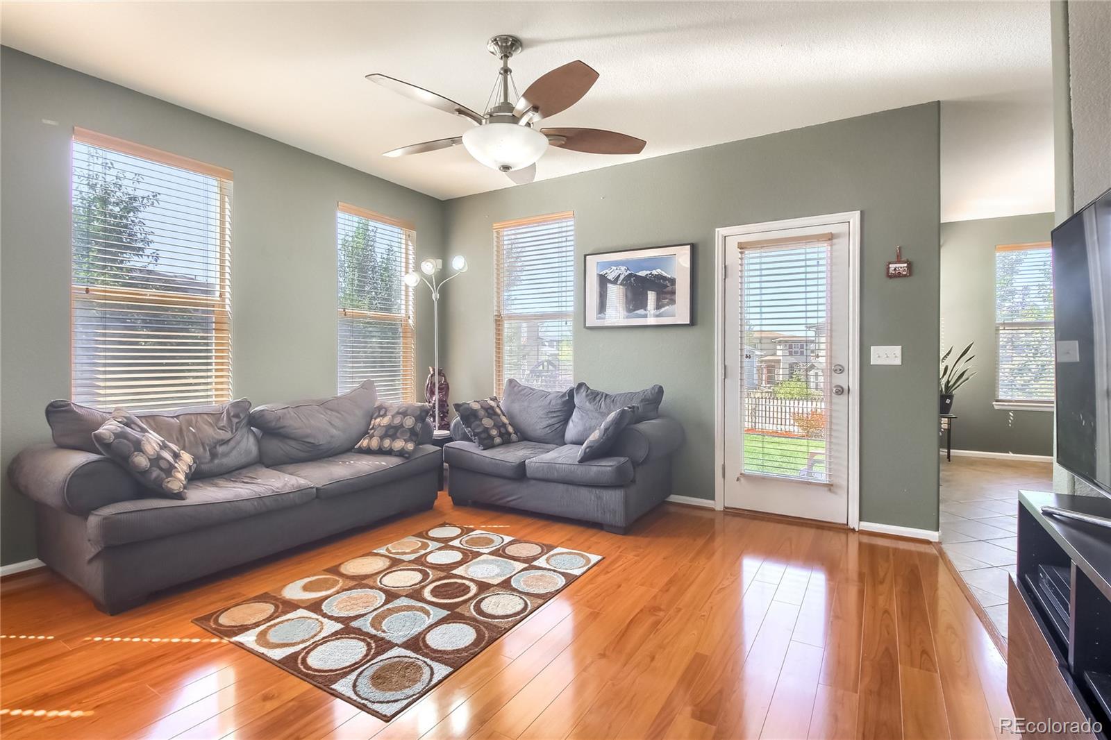 10861 Brooklawn Road Highlands Ranch, CO 80130 - Photo 3 of 30 a living room with furniture and a large window