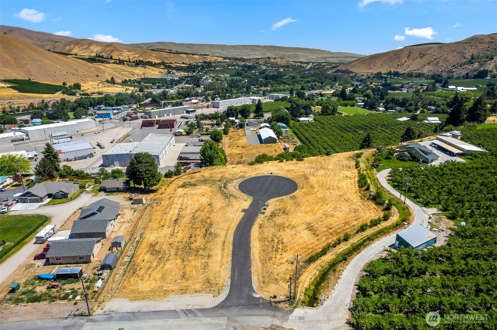 37 Penstemon Lane Monitor, WA 98836 - Photo 4 of 16 an aerial view of residential houses with outdoor space and river