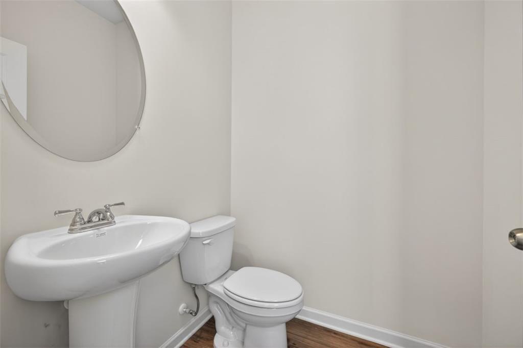 1007 Stiles Court, Unit 48 Cartersville, GA 30120 - Photo 13 of 34 a bathroom with a sink and a toilet