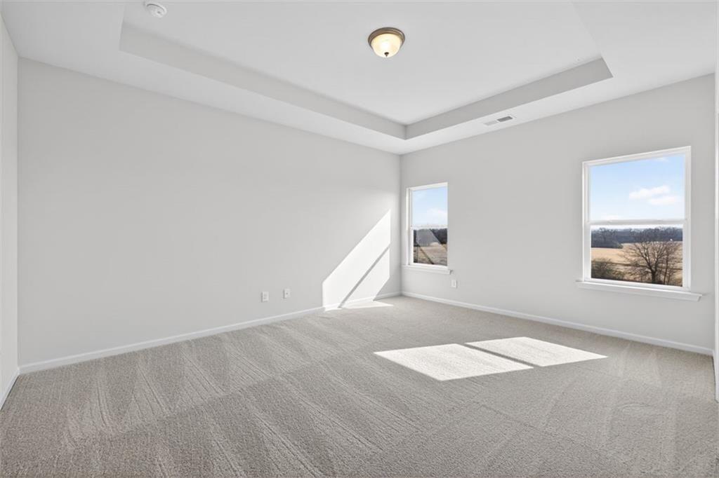 1007 Stiles Court, Unit 48 Cartersville, GA 30120 - Photo 23 of 34 a view of an empty room with a window