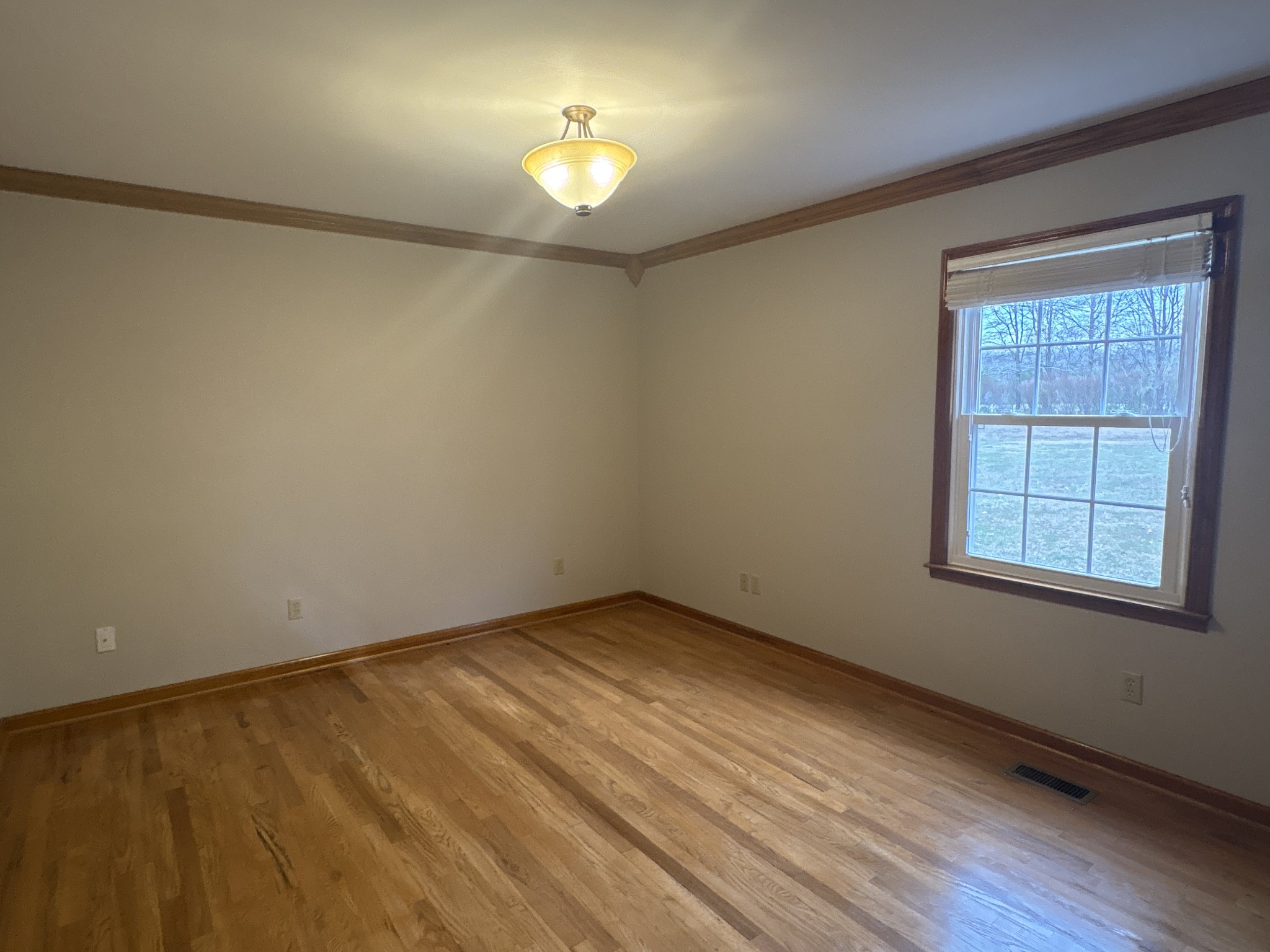 703 12 Oaks Road Tullahoma, TN 37388 - Photo 16 of 46 an empty room with a empty space and a window
