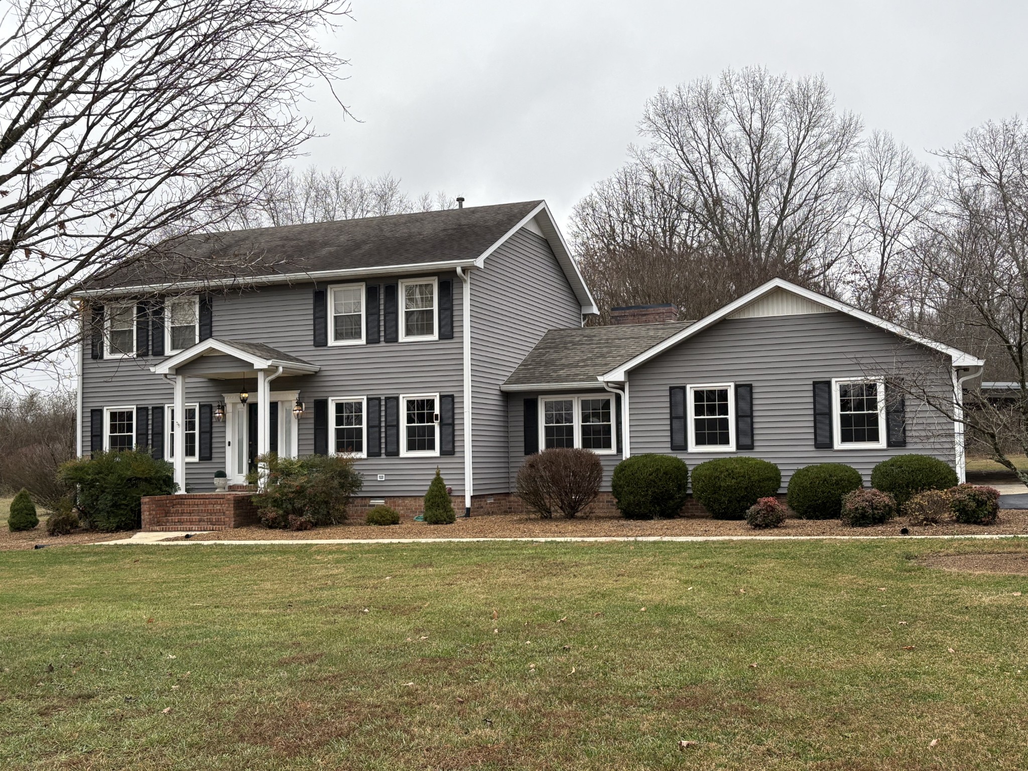 703 12 Oaks Road Tullahoma, TN 37388 - Photo 2 of 46 a front view of house with yard and green space