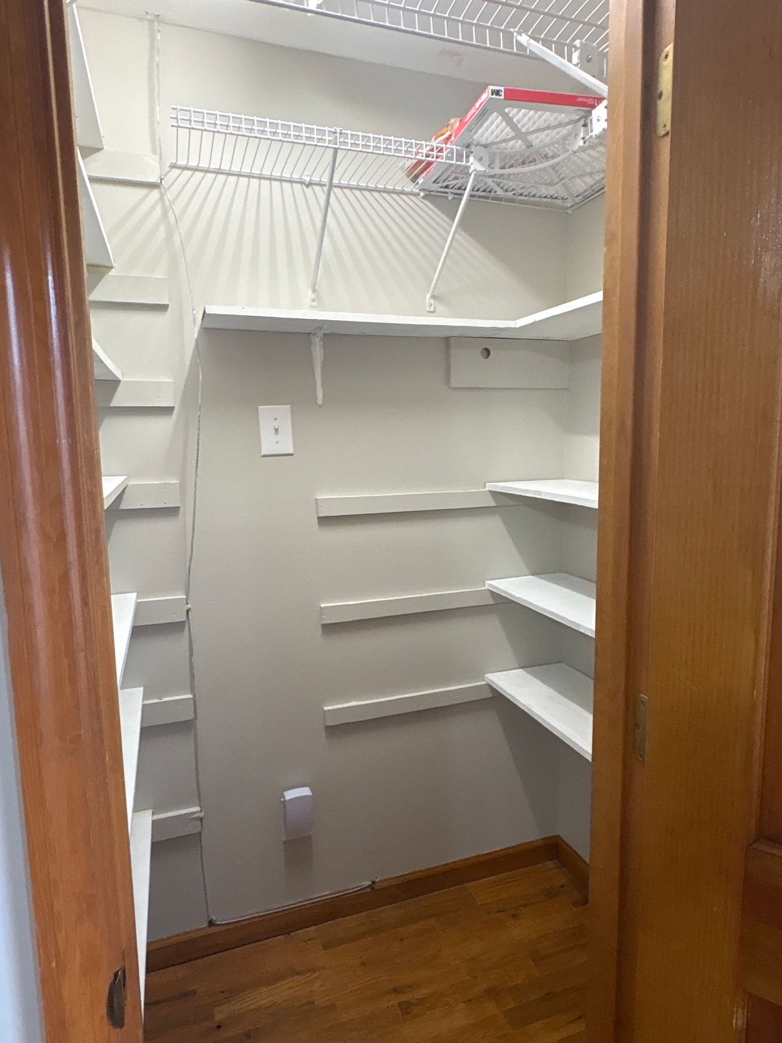 703 12 Oaks Road Tullahoma, TN 37388 - Photo 21 of 46 a view of walk in closet with empty racks