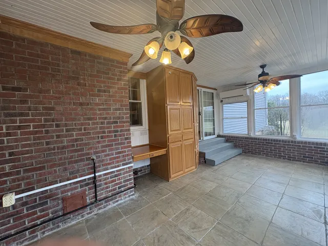 a view of a entryway door front of a house