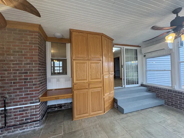 a view of a storage and utility room in a kitchen
