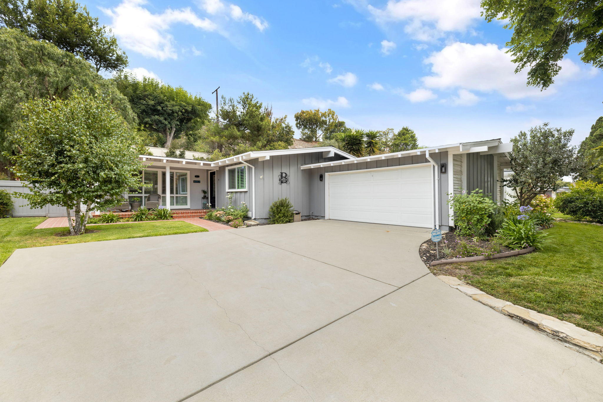 5853 Flambeau Road Rancho Palos Verdes, CA 90275 - Photo 1 of 32 a view of house with outdoor space and swimming pool