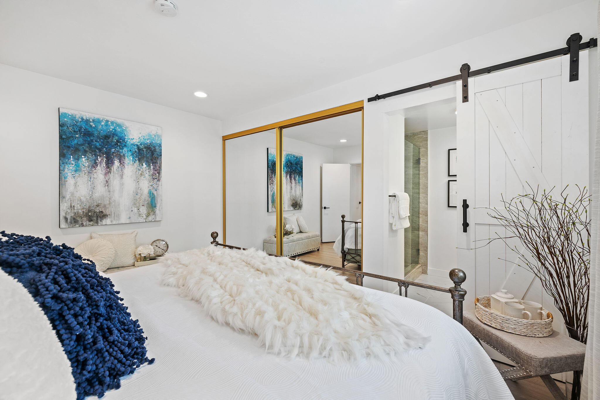 5853 Flambeau Road Rancho Palos Verdes, CA 90275 - Photo 22 of 32 a bedroom with a large bed and a chandelier