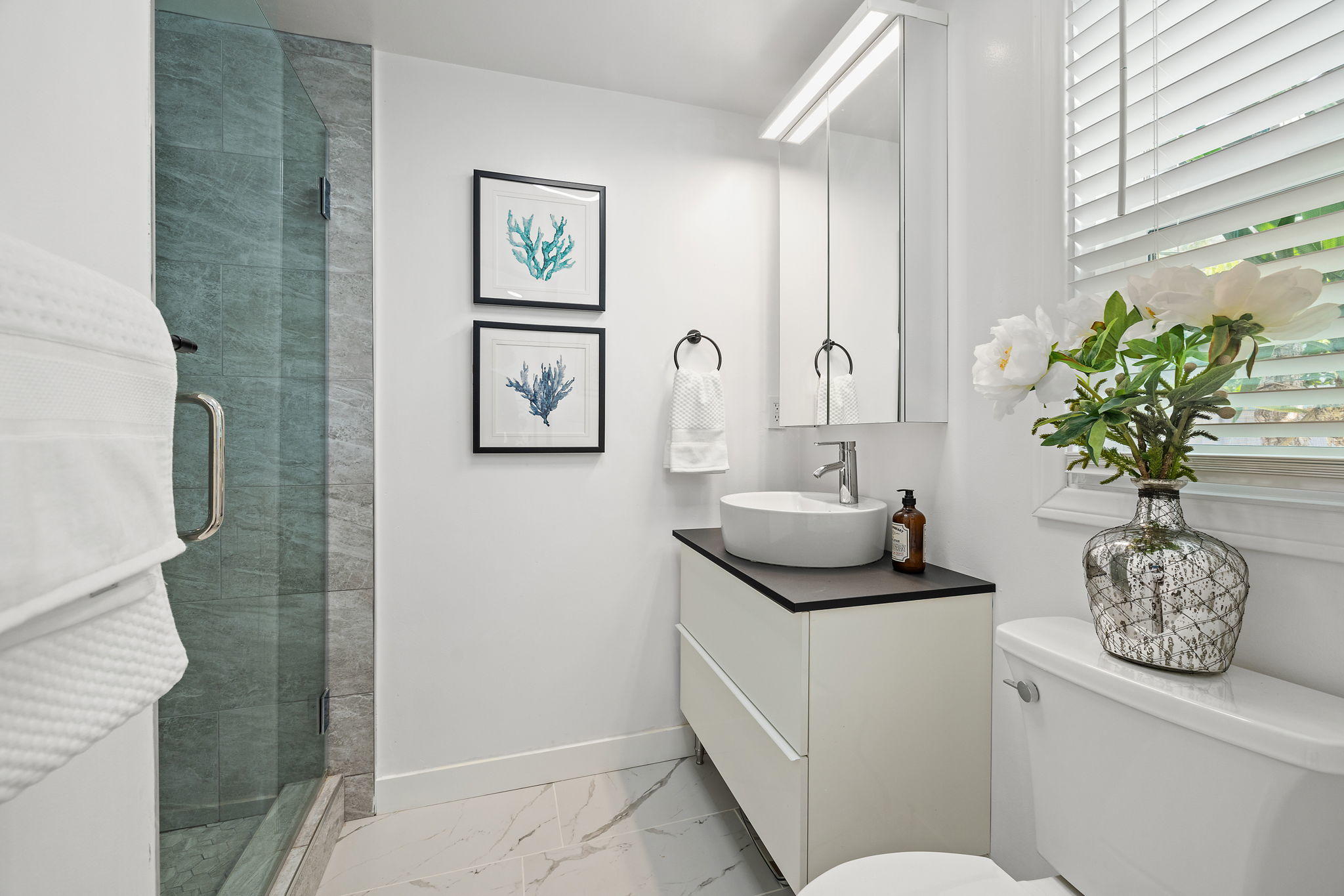 5853 Flambeau Road Rancho Palos Verdes, CA 90275 - Photo 23 of 32 a bathroom with a toilet a sink and mirror
