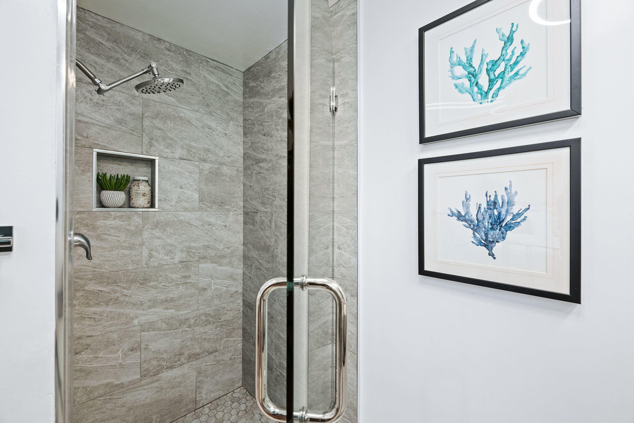 5853 Flambeau Road Rancho Palos Verdes, CA 90275 - Photo 24 of 32 a bathroom with a painting on the wall and a shower